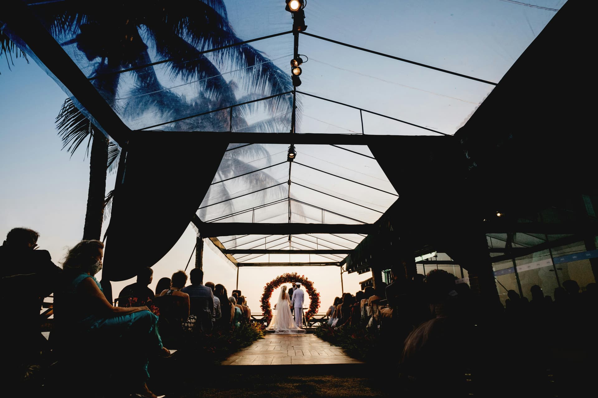 Elegant wedding reception with romantic lighting and sophisticated decor